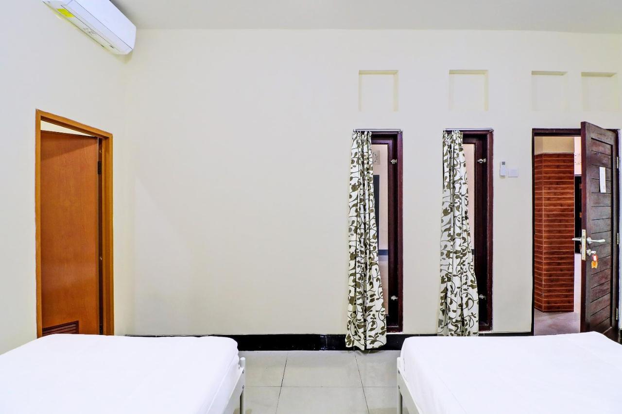 Oyo 91864 Holistic Stay Jimbaran Extérieur photo